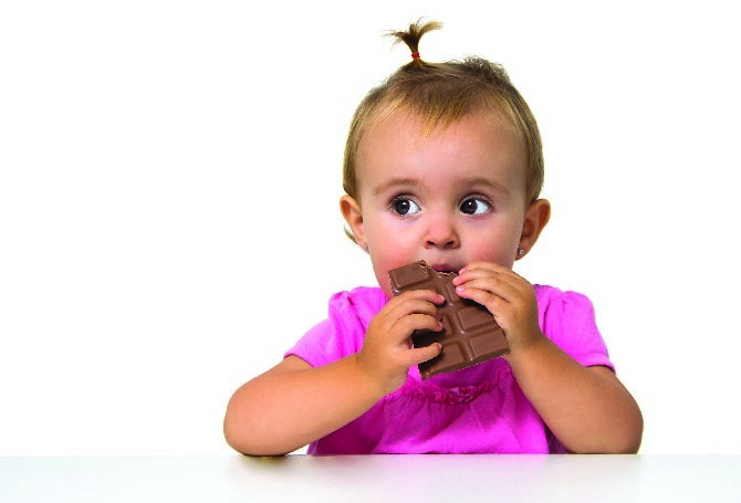baby eating chocolate