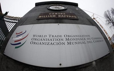 The World Trade Organization WTO logo is seen at the entrance of the WTO headquarters in Geneva