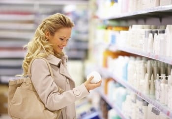 Portrait of a smiling blond with shopping bags